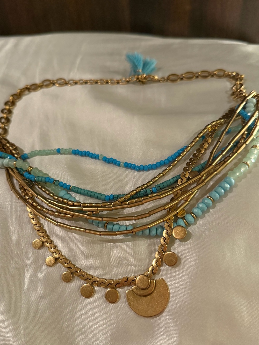 Gold-Tone Layered Charm Necklace with Turquoise Beads